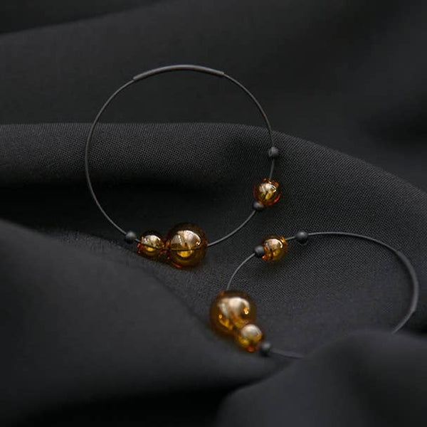 ECLIPSE HOOP EARRINGS - GREY/AMBER
