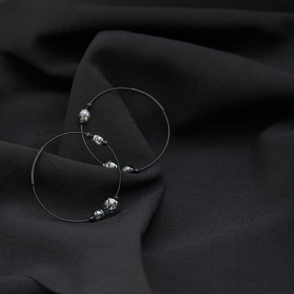 ECLIPSE HOOP EARRINGS - GREY/AMBER